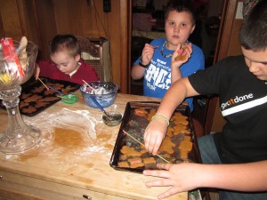boys painting gingerbread