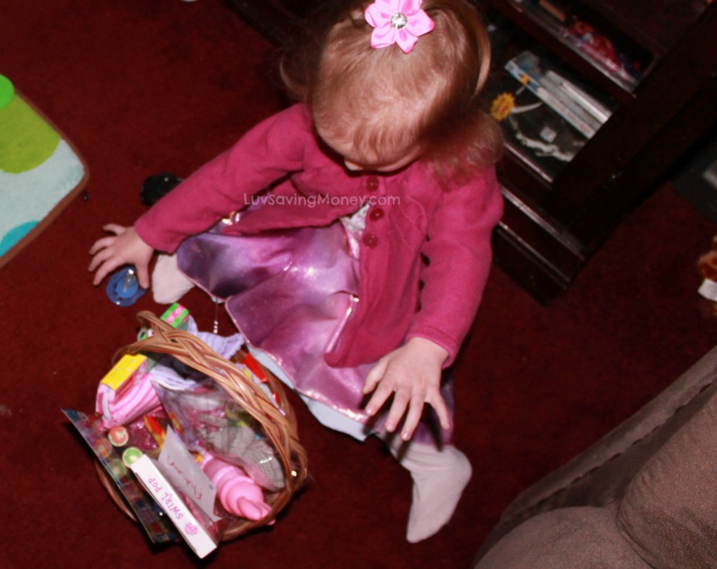 baby girl finds easter basket
